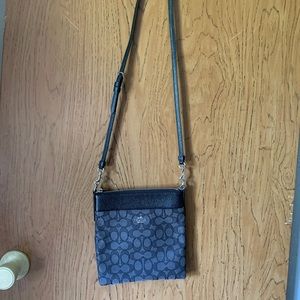 Selling a black coach crossbody